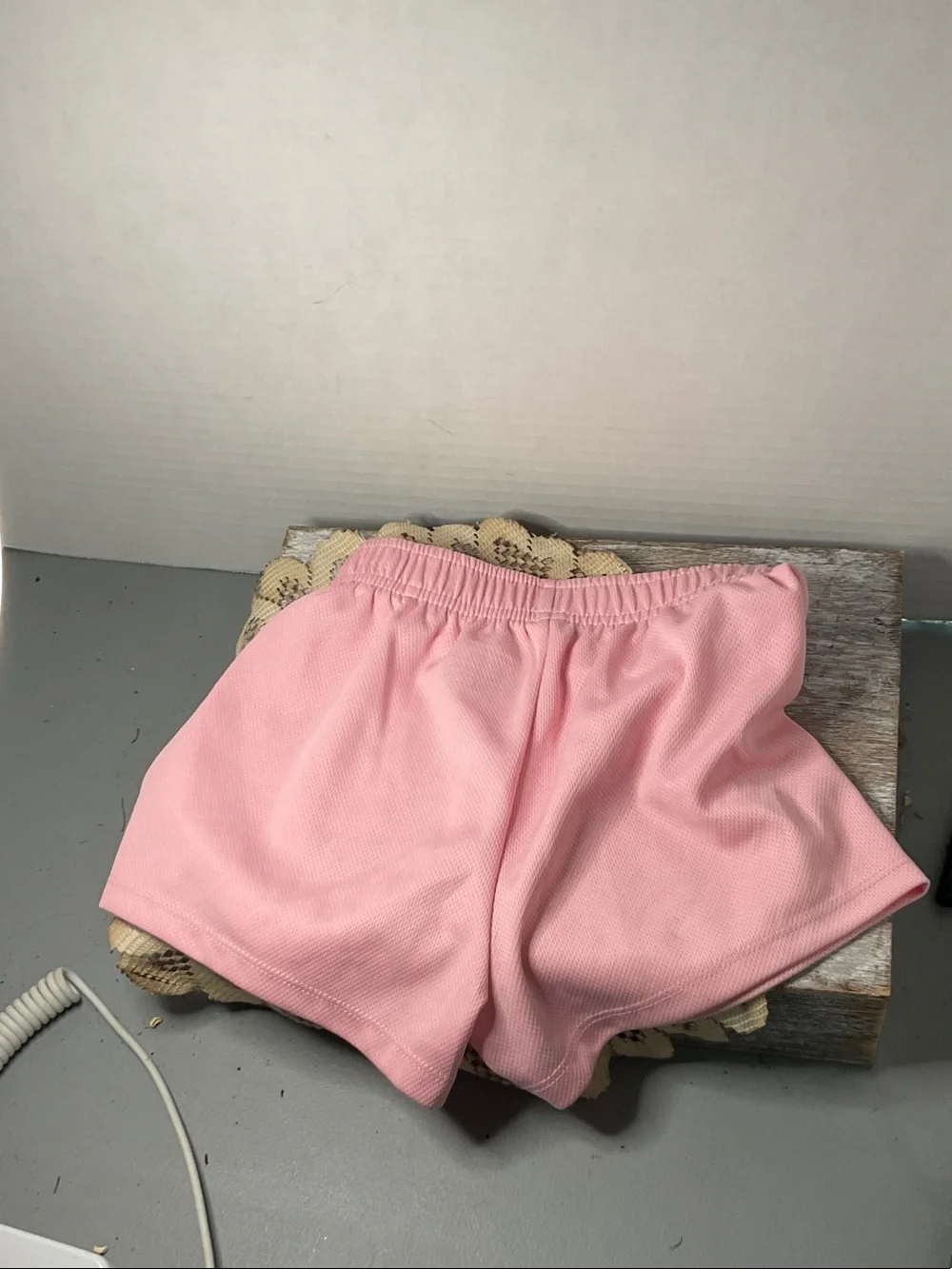 Nike Light Pink Athletic Shorts with White Swoosh